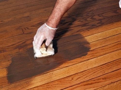 How To Fix The Leakage Underneath You Wood Flooring? refinishing-the-floor