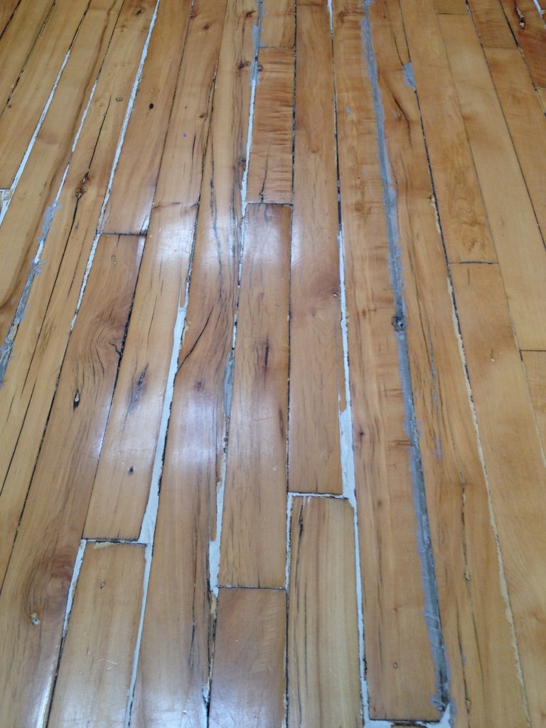 What Is A Wood Flooring Filler? applying wood floor filler