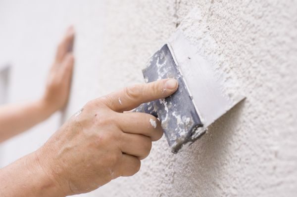 How To Protect Wood Flooring During Home Improvement Work? plastering-the-wall